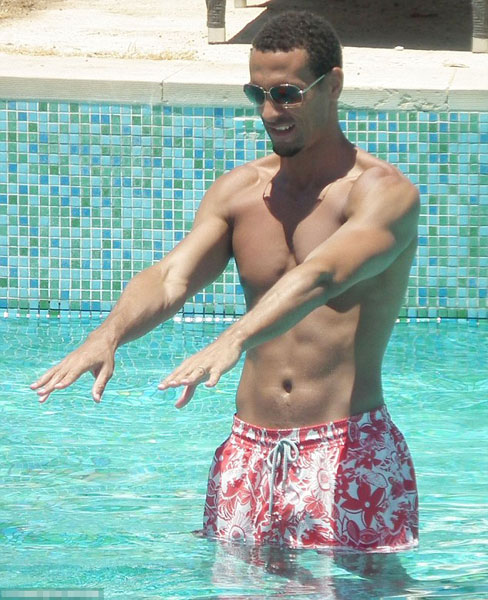 While the team will play... Rio is away: Ferdinand soaks up the sun in Cyprus as England head to the Euros without him