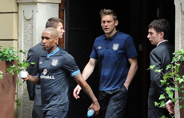 Off they go: The England team bus leaves for training