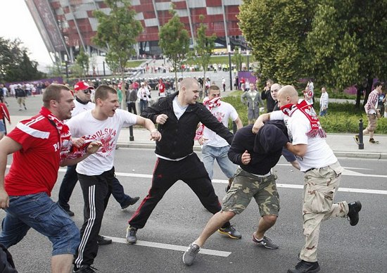 Warsaw turns into a war zone with more than 100 arrested before Poland v Russia