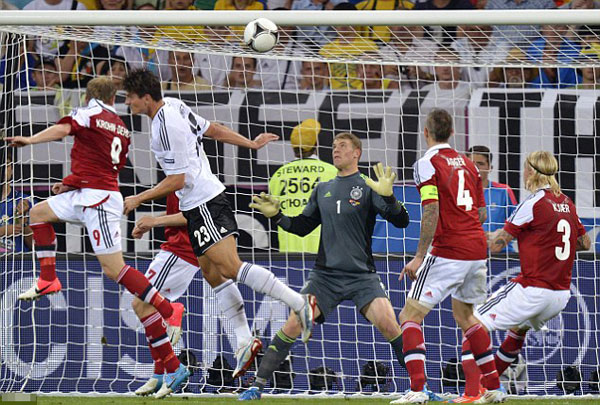 Denmark 1 Germany 2: Danes heading home as ton-up Podolski sets up Greece clash