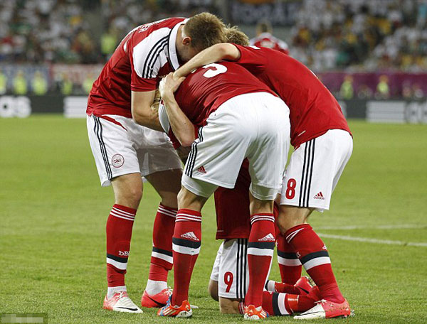 Denmark 1 Germany 2: Danes heading home as ton-up Podolski sets up Greece clash