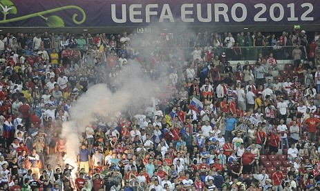 Russia hit by £28,000 UEFA fine after fans display illicit banners and lob fireworks in Greece loss
