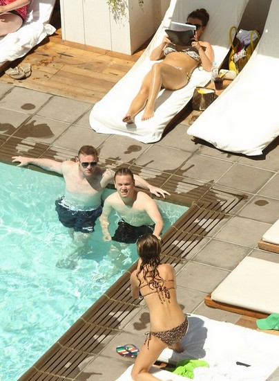 Distracting themselves from the football! Wayne and Coleen Rooney enjoy tour of LA sights during Euro 2012 semi final match