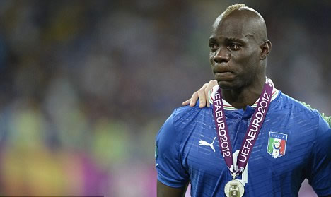 Balotelli in tears after star storms off before returning to collect losers medal