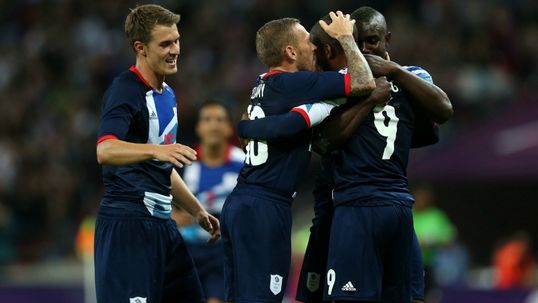 GB edge to quarters; Spain crash out