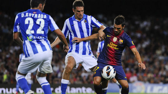 Xavi celebrates return of Villa