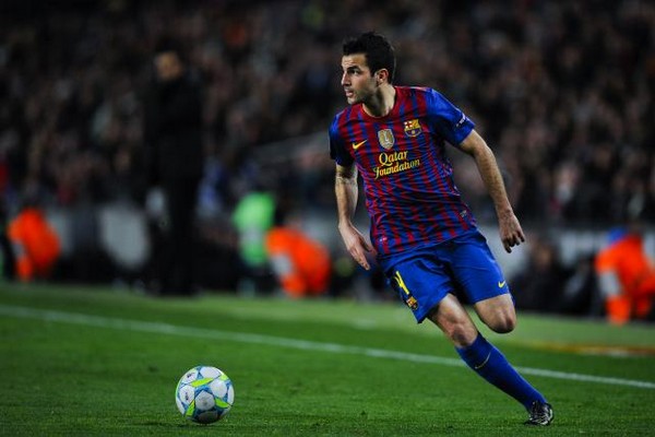 Fabregas is happy at Barcelona, insists Pique