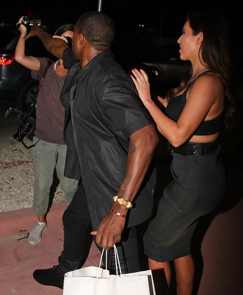 Kanye West flies into a fit of rage after he and Kim Kardashian nearly bump into her ex-boyfriend Reggie Bush