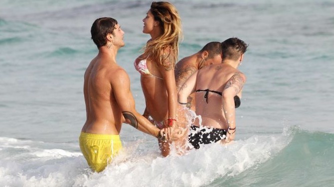 Marco Borriello's ex-girlfriend Belen Rodriguez with her boyfriend enjoy themselves in the sea