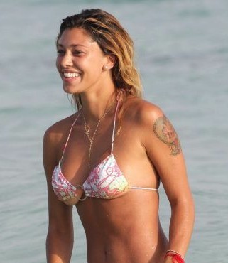 Marco Borriello's ex-girlfriend Belen Rodriguez with her boyfriend enjoy themselves in the sea