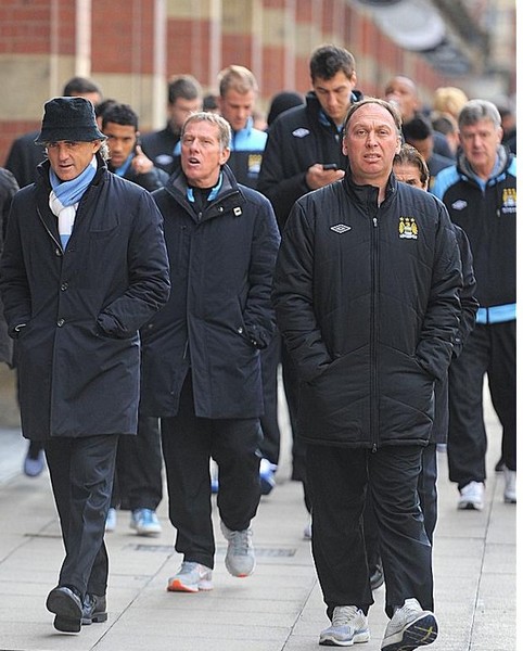 Roberto Mancini takes his City stars for pre-match walk