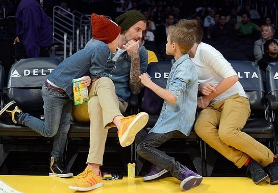 David Beckham Footie ace grapples with son Romeo