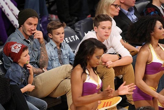 David Beckham Footie ace grapples with son Romeo