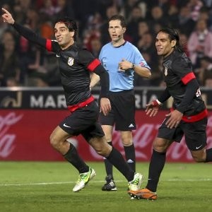 Atletico win to keep pace with Barca