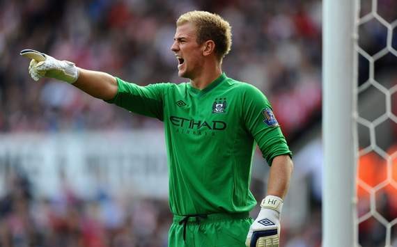 Manchester City can still win the title, insists Hart