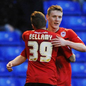 Cardiff boost promotion bid with win