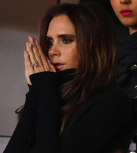 V for Vic-tory! Victoria Beckham watches as hubby David helps new club PSG to 2-0 win