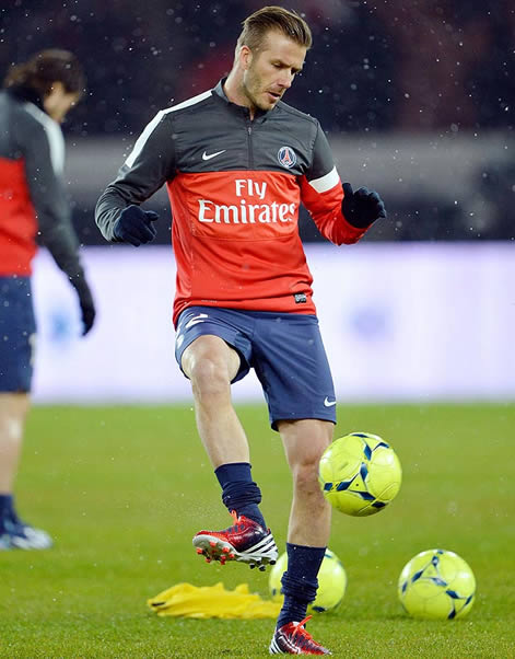 V for Vic-tory! Victoria Beckham watches as hubby David helps new club PSG to 2-0 win