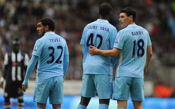 Yaya Toure's new deal has given Manchester City a lift, says Barry