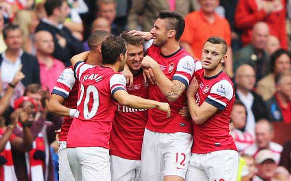 Arsenal 3-1 Stoke City: Ozil sets up Gunners treble