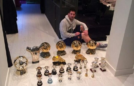 This is WHY Messi should beat Ronaldo to the Ballon d'Or! Brother posts picture of Barcelona star swamped in trophies