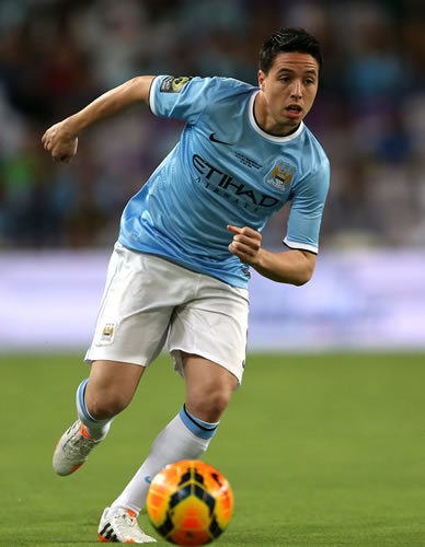 Manchester City's Samir Nasri set extend his stay at the Etihad