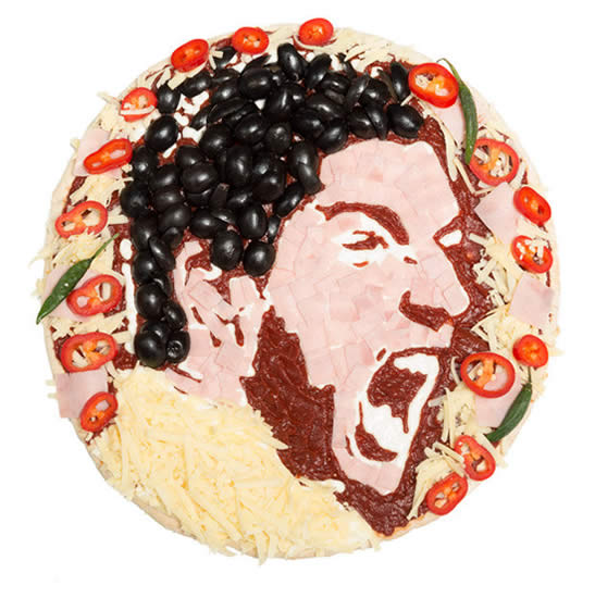 SNAPPED: Liverpool star Luis Suarez turned into a PIZZA!