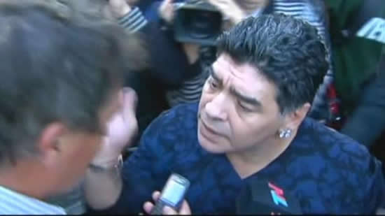 Maradona slaps reporter's face outside theater