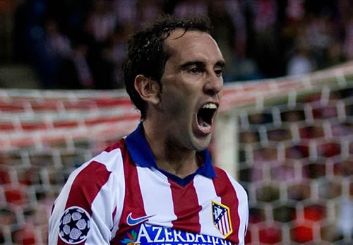 Simeone laughs off Manchester United's proposed Godin bid