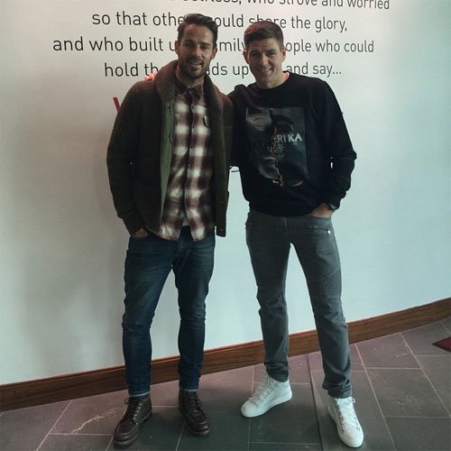 Liverpool's Steven Gerrard catches up with Jamie Redknapp