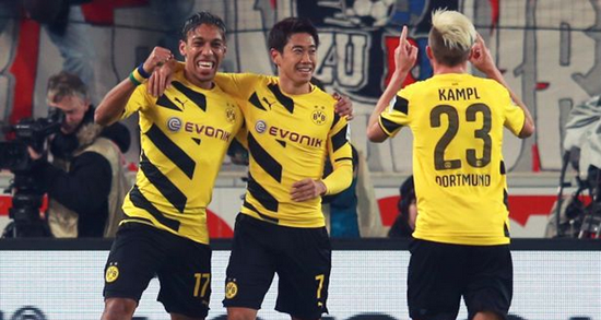 Dortmund keep winning streak alive, edge struggling Stuttgart