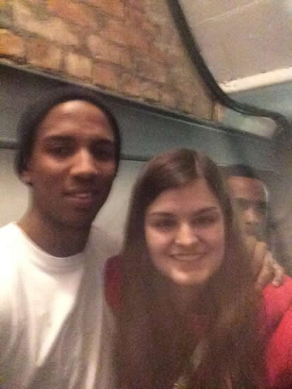 Man United player and good samaritan Ashley Young helps out Man City fan