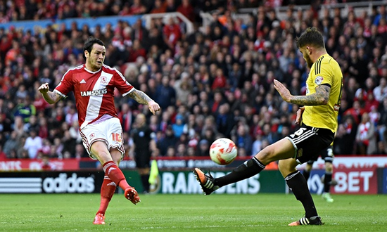 Middlesbrough brush off Brentford to stand one step from top-flight return