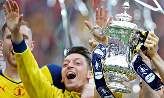 Mesut Ozil sets Arsenal sights high next season at home and in Europe