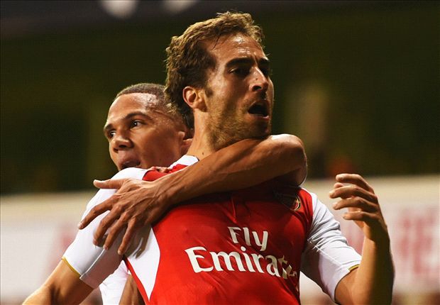 Tottenham 1-2 Arsenal: Flamini brace sends Gunners into round four