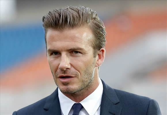 David Beckham delights kids with game in Buenos Aires shanty town