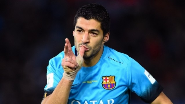 Suarez urges Barca to kick on
