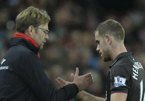 Liverpool face anxious wait on Henderson injury