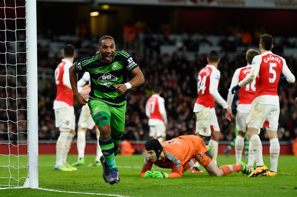 Arsenal 1 - 2 Swansea City: Swansea stun Arsenal to leave Arsene Wenger's side chasing Foxes from afar