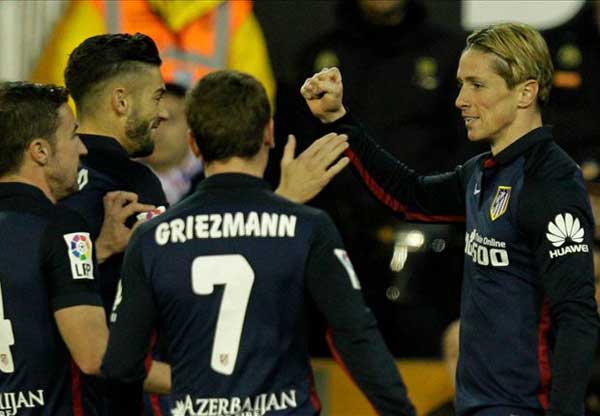 Valencia 1-3 Atletico: Torres on target as Neville's men falter