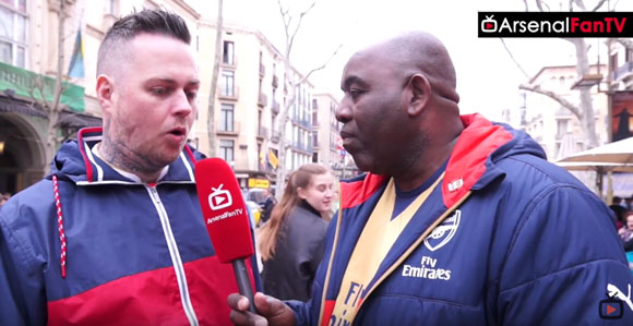 Arsenal fan with 'Wenger Out' banner explains why he brought it to Barcelona