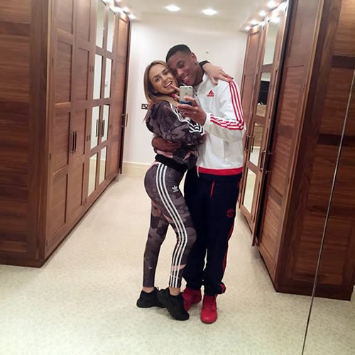 Anthony Martial celebrates with his wife after Man Utd beat Man City