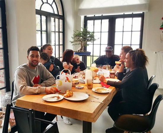 Mousa Dembele all smiles with his family ahead of Liverpool v Tottenham