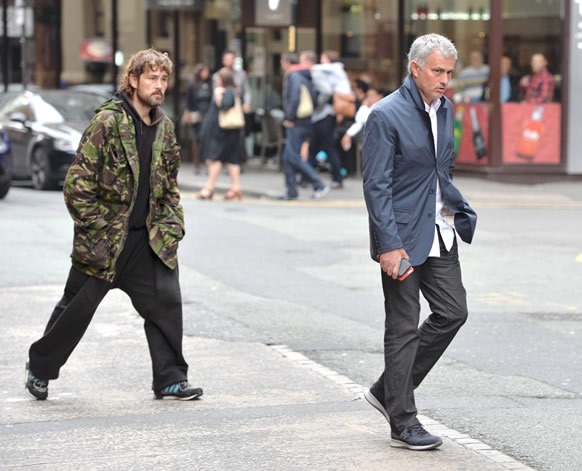 GENEROUS JOSE Manchester United boss Jose Mourinho gives homeless man £20 but can’t pull a smile for fan’s selfie