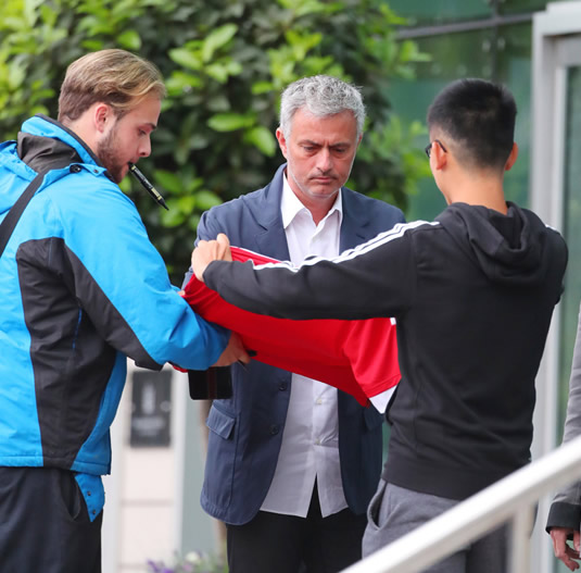 GENEROUS JOSE Manchester United boss Jose Mourinho gives homeless man £20 but can’t pull a smile for fan’s selfie