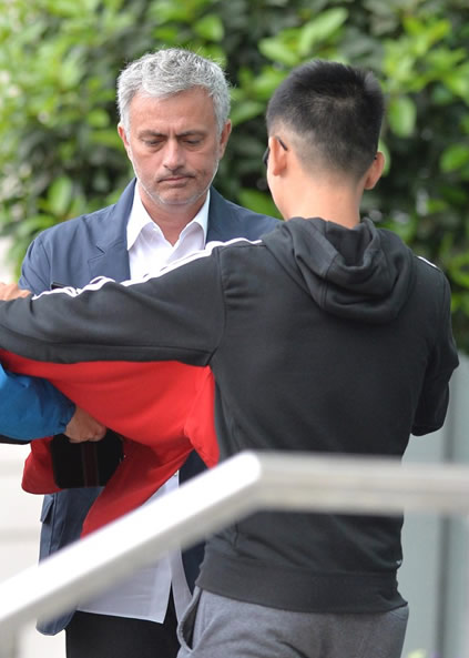 GENEROUS JOSE Manchester United boss Jose Mourinho gives homeless man £20 but can’t pull a smile for fan’s selfie