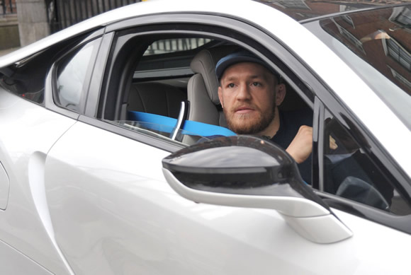 Manchester United captain Wayne Rooney arrives to training in style driving a BMW worth over £100,000