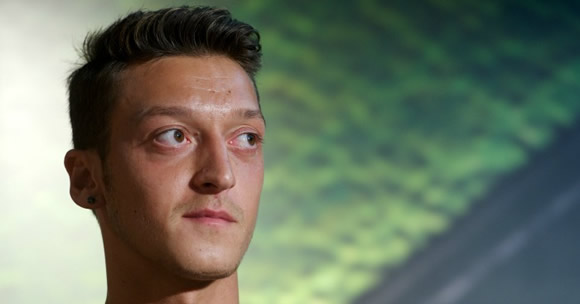 Arsenal star Ozil would 'jump at chance' of Real return