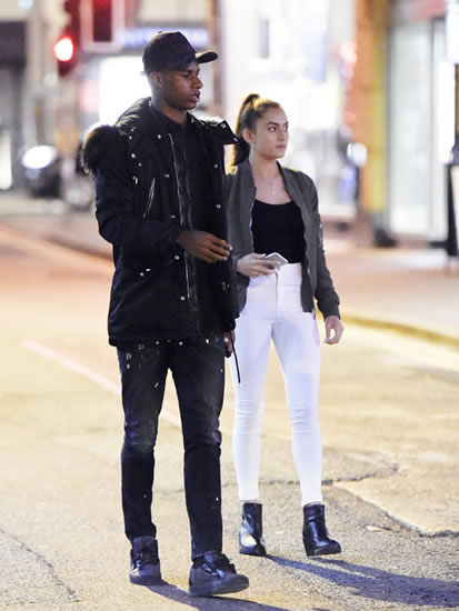 Ace Marcus Rashford snapped with mystery brunette on Manchester night out