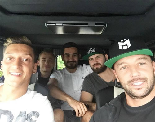 Arsenal's Mesut Ozil all smiles with new Man City signing